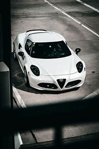 Результаты поиска изображений по запросу "Alfa Romeo White Car"