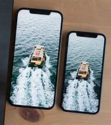 Image result for iPhone 12 Mini vs Nothing Phone +1