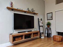 Image result for Floating Shelf above Wall TV