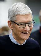 Image result for Tim Cook Eating an Apple