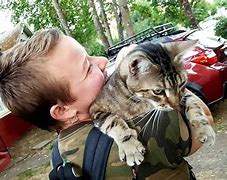 Image result for Cat Hugs Owner