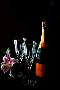 Image result for Champagne with Black Bottle White Flowers