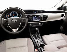 Image result for 2016 Toyota Corolla White Tan Interior