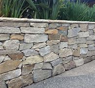 Image result for Natural Stone Veneer Retaining Wall