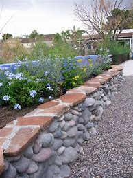 Image result for River Rock Flower Bed Landscaping