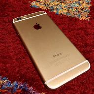 Image result for Gold iPhone 6 Plus in Hand