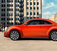Image result for Red-Orange Volkswagen Beetle