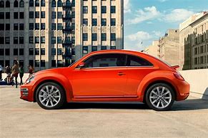 Image result for Orange Volkswagen Beetle
