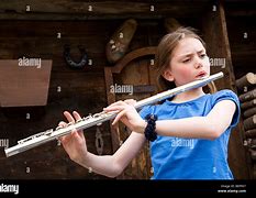 Image result for Girl Playing Indian Flute