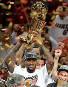 Image result for Miami Heat LeBron Holding Trophy