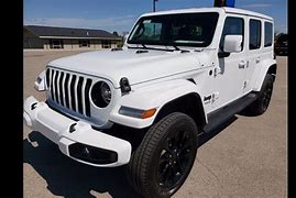 Image result for White 4 Door Jeep with Chrome Bumper