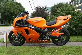Image result for Orange Motorcycle Silver Frame
