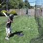 Image result for Softball Pitching Machine