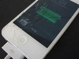 Image result for Cracked iPhone 4