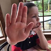 Image result for Child Holding iPhone 13 Mini