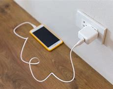 Image result for Burnt iPhone Charger in the Socket