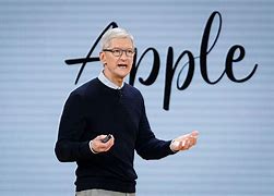 Image result for Tim Cook Eating an Apple