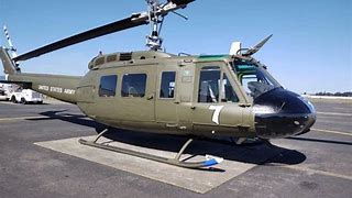 Image result for Bell 12 Huey