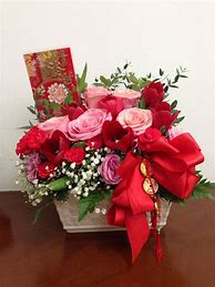 Image result for Chinese New Year Flower Arrangement with Red Table Runner