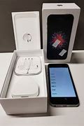 Image result for iPhone SE Silver with Accessories and Box