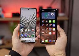 Image result for Pixel 6 vs iPhone 14