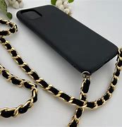 Image result for Black Carbon Case On Gold Phone