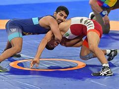 Image result for Wrestling in India with Dirt