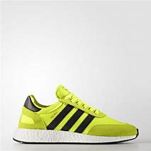 Image result for Yellow and Red Adidas Mismatch