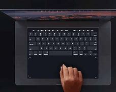 Image result for MacBook Pro with Touch-Bar On Keyboard