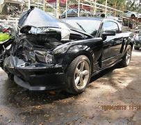 Image result for wrecked black mustang