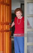 Image result for A Woman Answering a Door