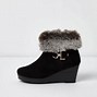 Image result for Jeans with fur boots