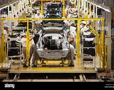 Image result for Auto Assembly Line Workers Group Photo