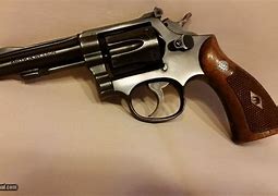 Image result for Smith and Wesson Combat Masterpiece 38