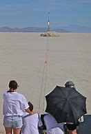 Image result for Person Looking at Rocket Launch