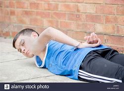 Image result for Man in Handcuffs On the Ground