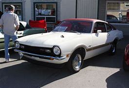 Image result for Yellow Ford Maverick