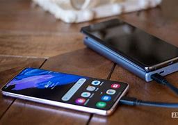 Image result for Power Bank Charging Phone