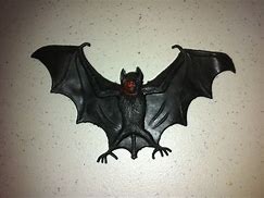 Image result for 11 X 5 Vintage Black Rubber Bat