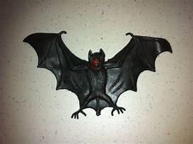 Image result for Vintage Rubber Toys Bat