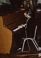 Image result for John Lennon Playing Piano
