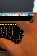 Image result for MacBook Pro Touch Bar Emoji