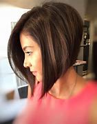 Image result for Woman with Sharp Features Hair Up