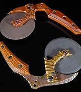 Image result for Pizza Cutter Brass Knuckles