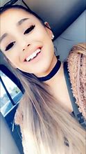 Image result for Ariana Grande Gold Teeth