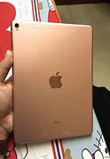 Image result for Rose Gold iPad with Apple Pen