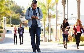 Image result for Distracted Walking On Cell Phone