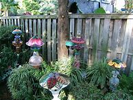 Image result for Upcycled Yard Art