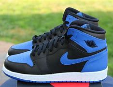 Image result for Air Jordan 1 Black with a Blue Stripe with Basketball Imprints On the Body