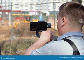 Image result for Person Videotaing